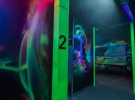 Laser tag arena filled with colors and neon colors, ready for stag groups in Hamburg